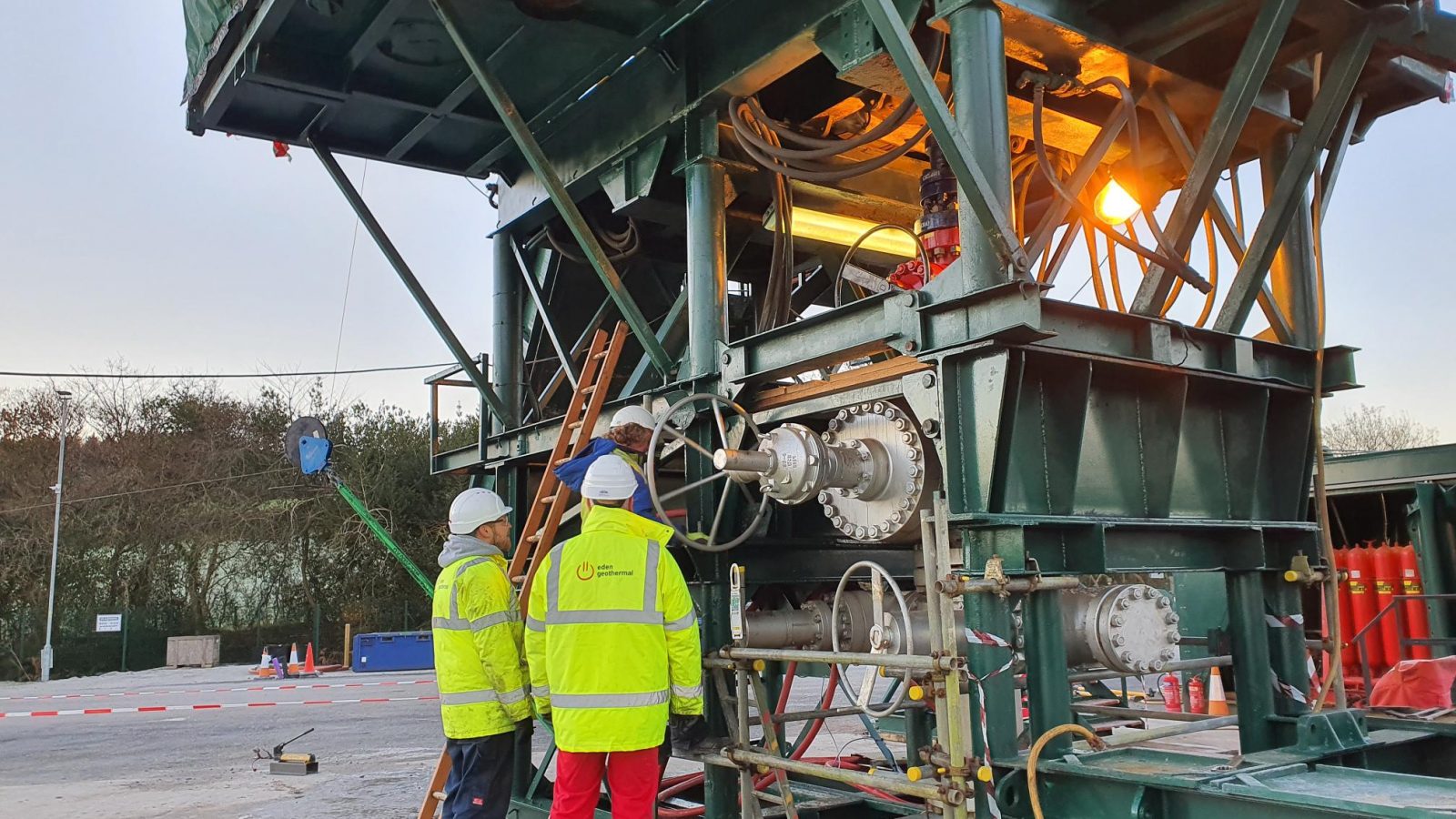 Robbie & another at wellhead